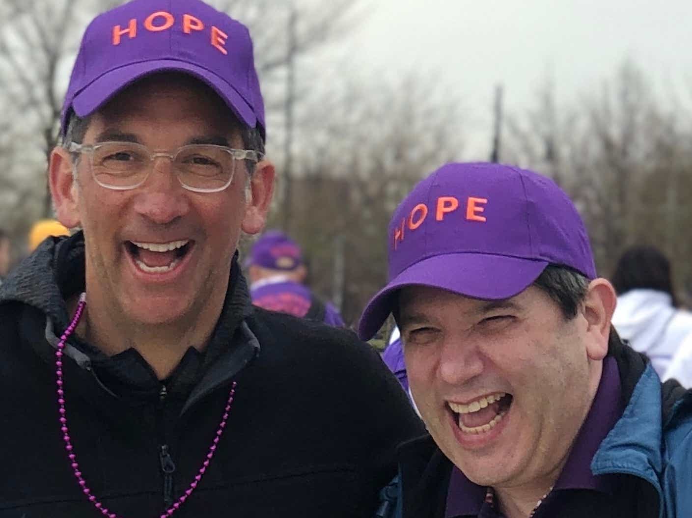 Brothers on pancreatic cancer wearing hope hats