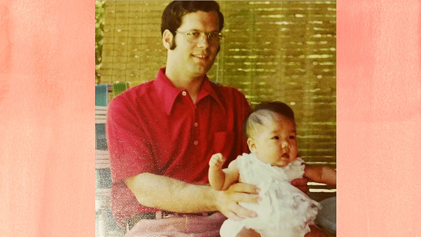 Kristin as baby and dad
