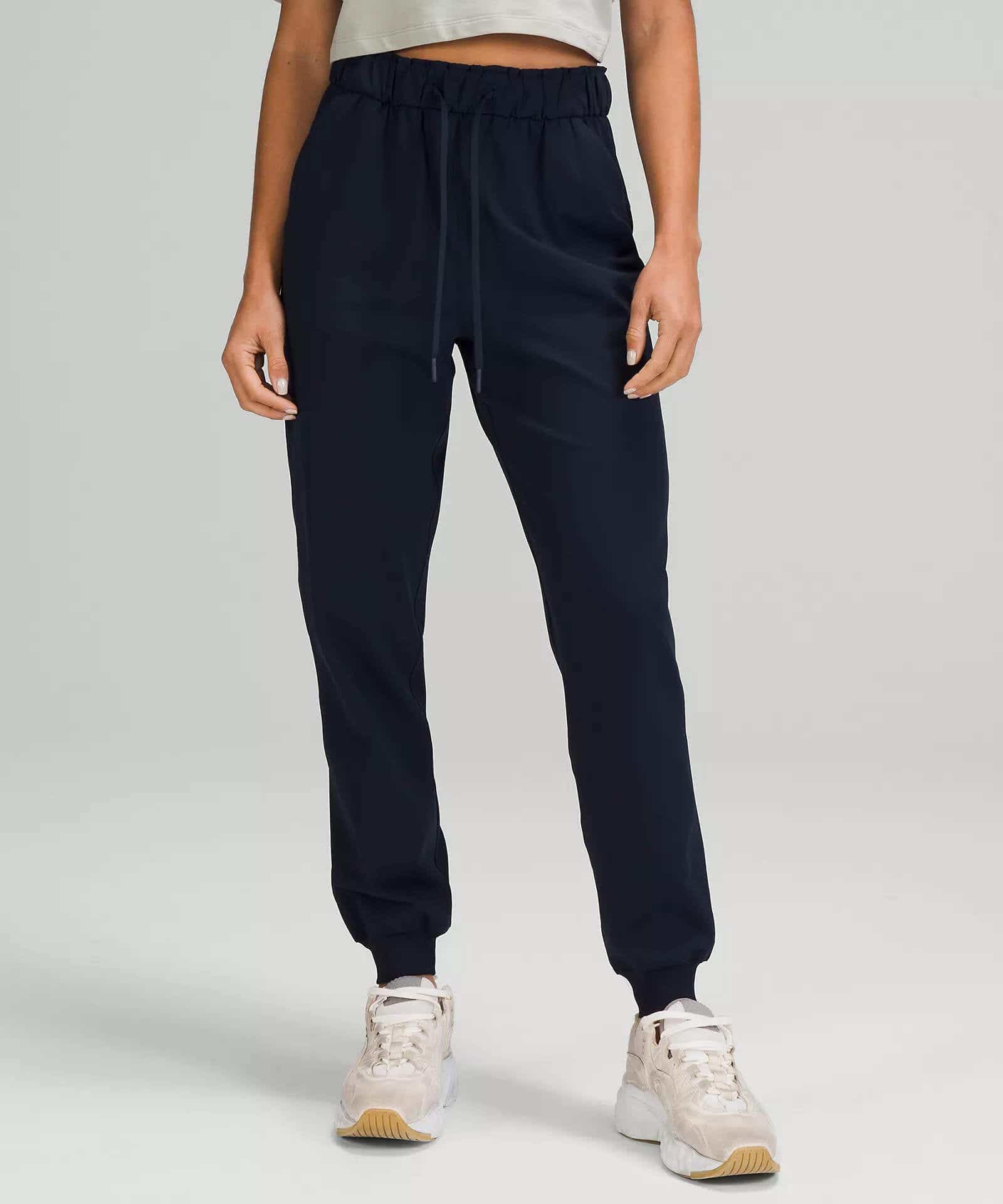 navy blue jogger pants on model