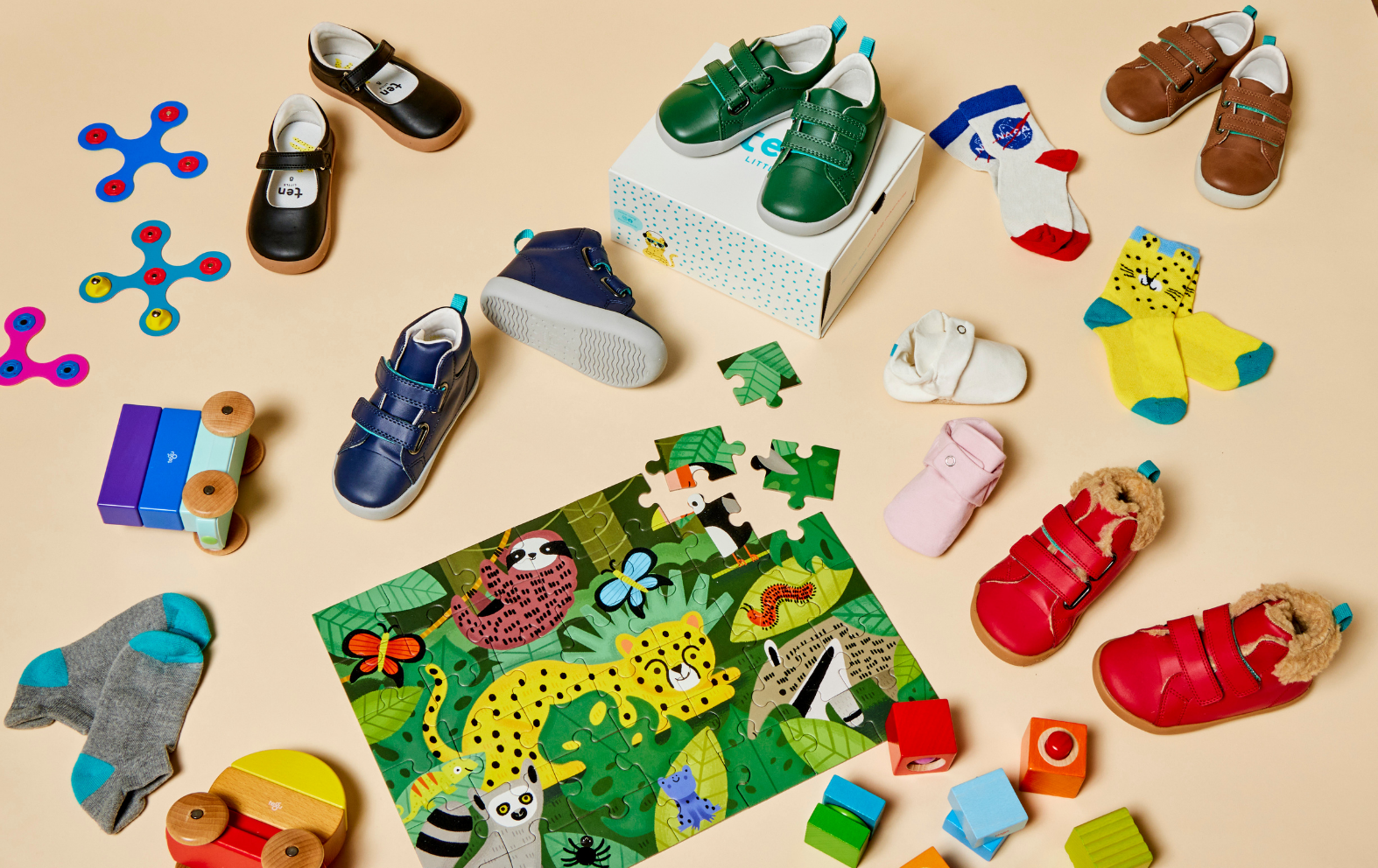 Assorted children's shoes and toys