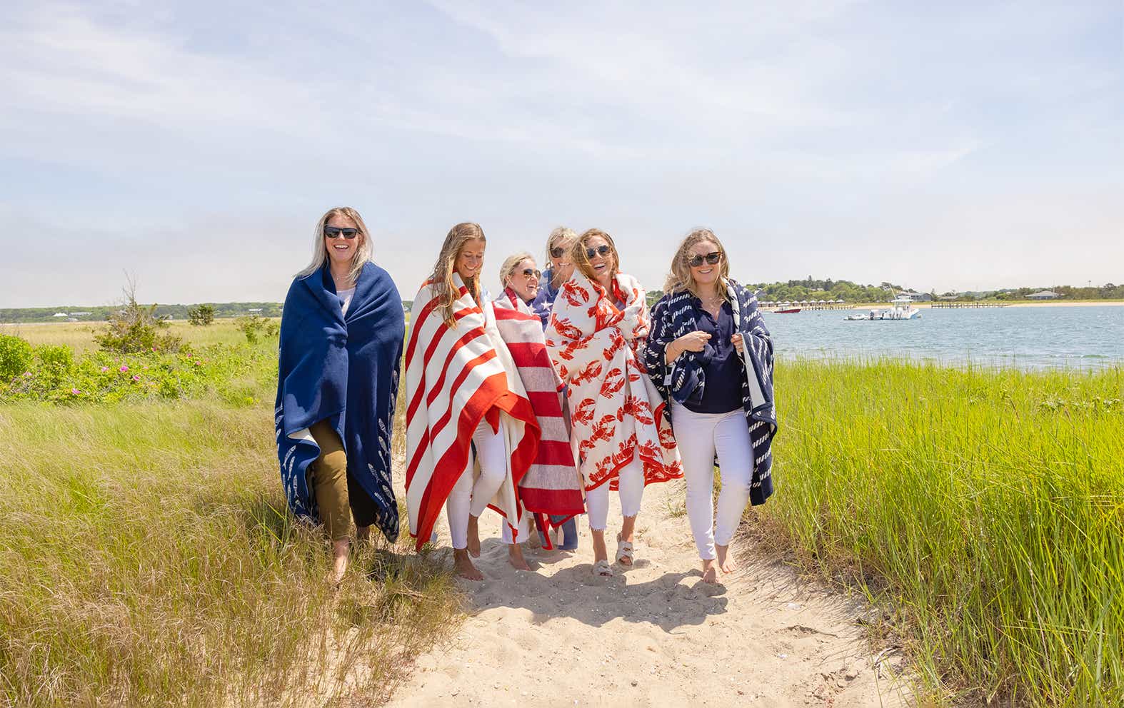 Girldreinds wearing Chappywrap blankets