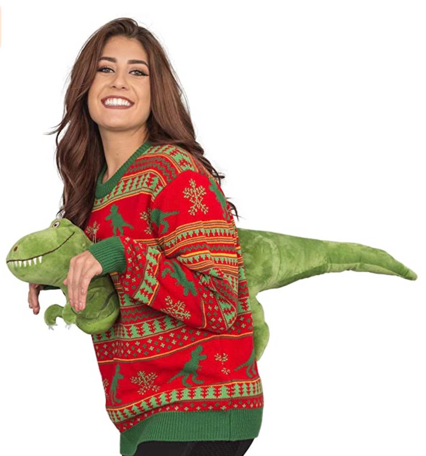 Funny holiday sweater with dinosaurs