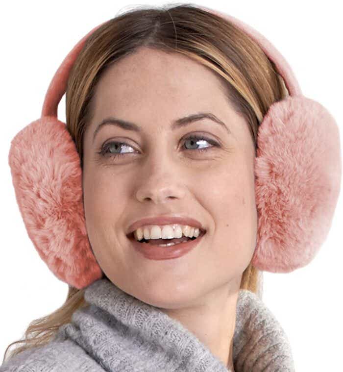 pink ear muffs on model