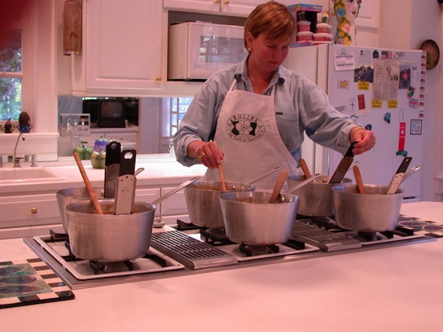 Caroline Ragsdale Reutter, owner of Caroline's Cakes, baking in her kitchen