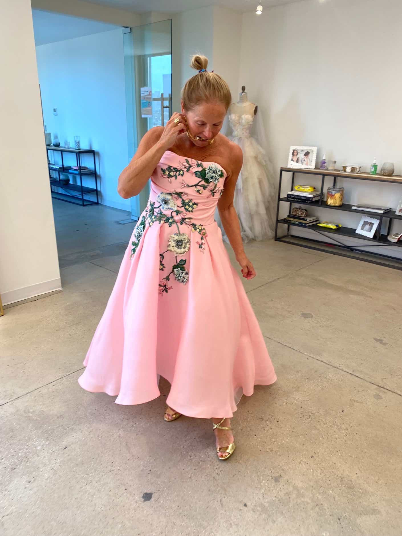 katie couric in a pink floral marchesa gown. 