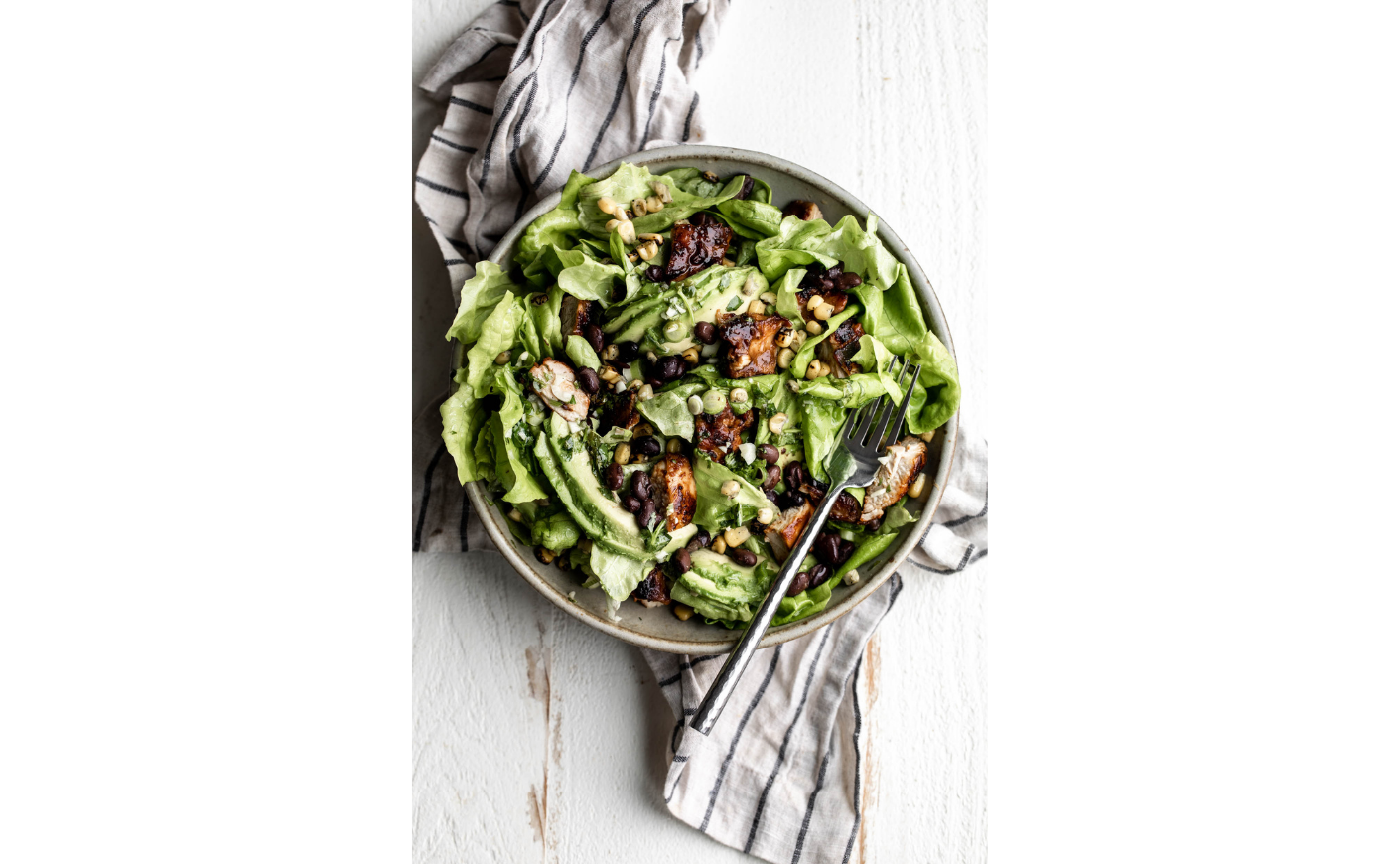 Southwest Salad with BBQ Chicken cooking with cocktail rings