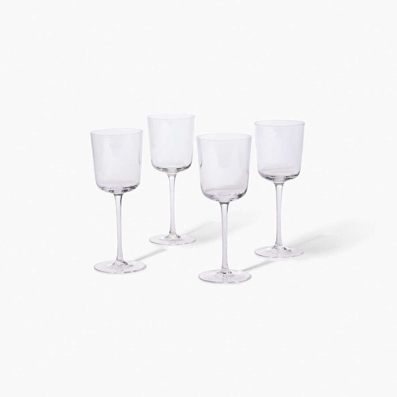 four empty glass cups