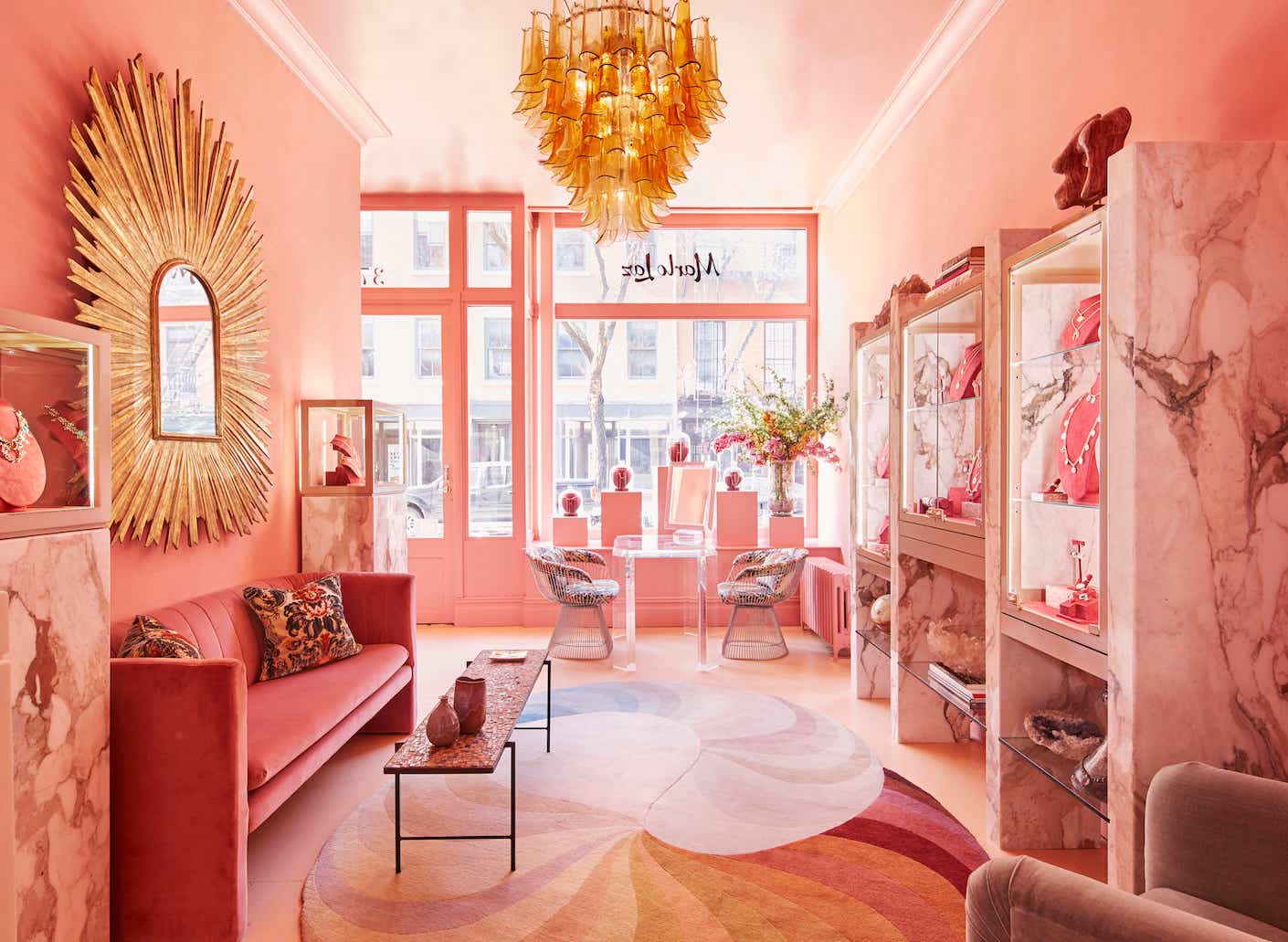 inside the Marlo Laz jewelry store with pink and gold designs