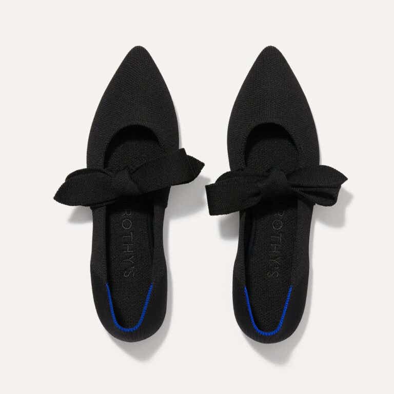 black point flats with a bow tie