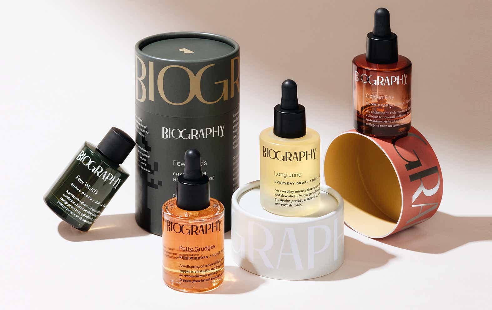 Biography face oils on a neutral background