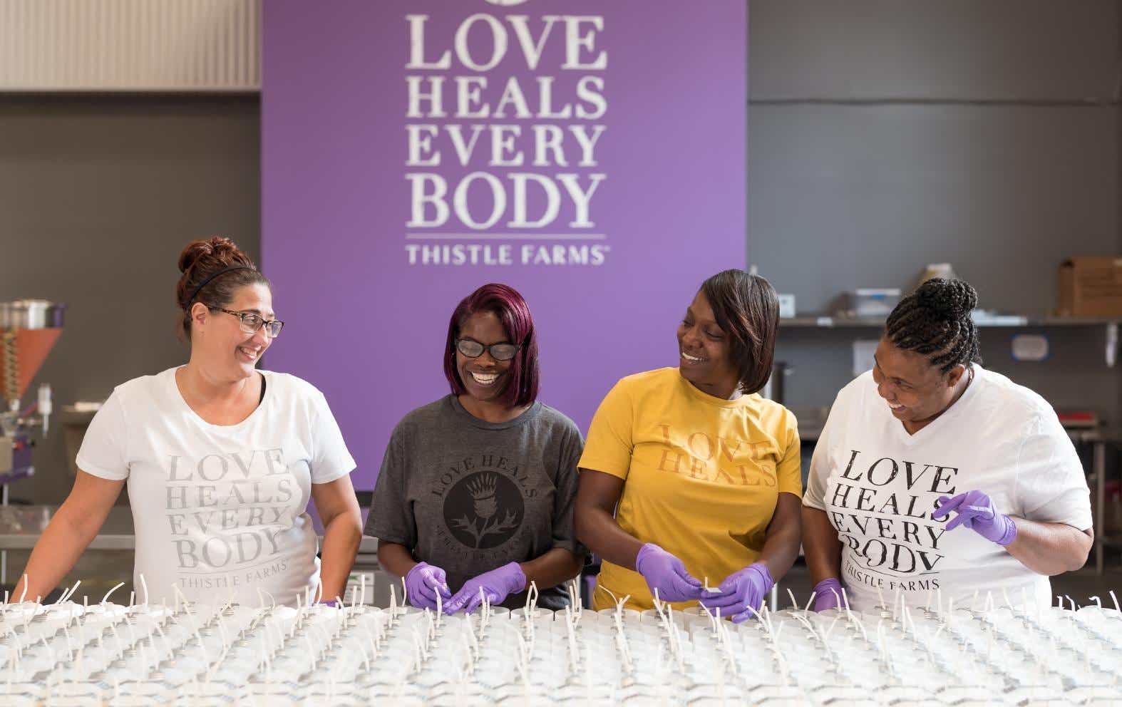 Thistle Farms employees making candles