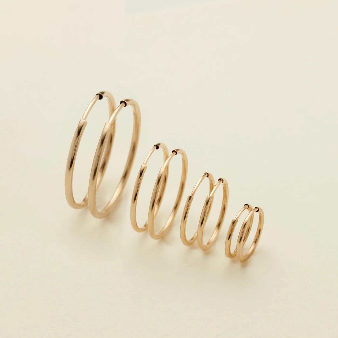 gold hoops lined up in a row