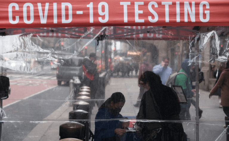 image of a Covid testing site on a NYC sidewalk