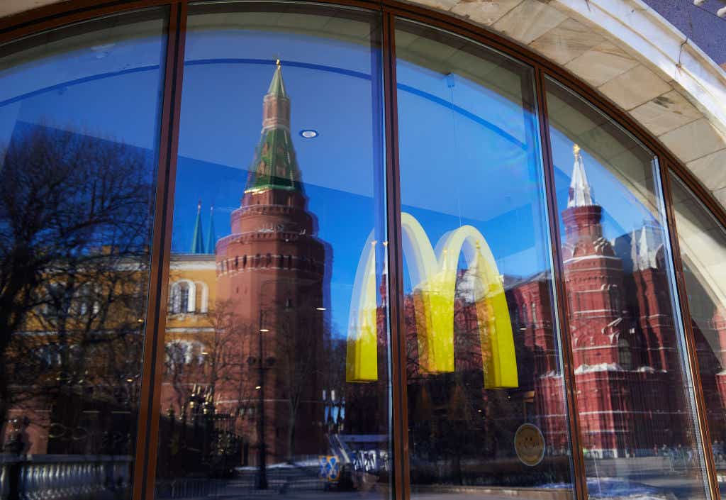 The Kremlin towers is reflected in a McDonald's display on March 9, 2022 in Moscow, Russia.