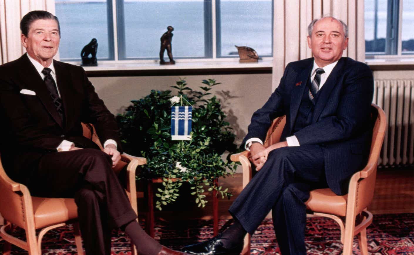 Soviet leader Mikhail Gorbachev and U.S. President Ronald Reagan sit down for the first mini-summit talk Oct. 11th 1986