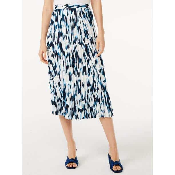 model in blue and white skirt