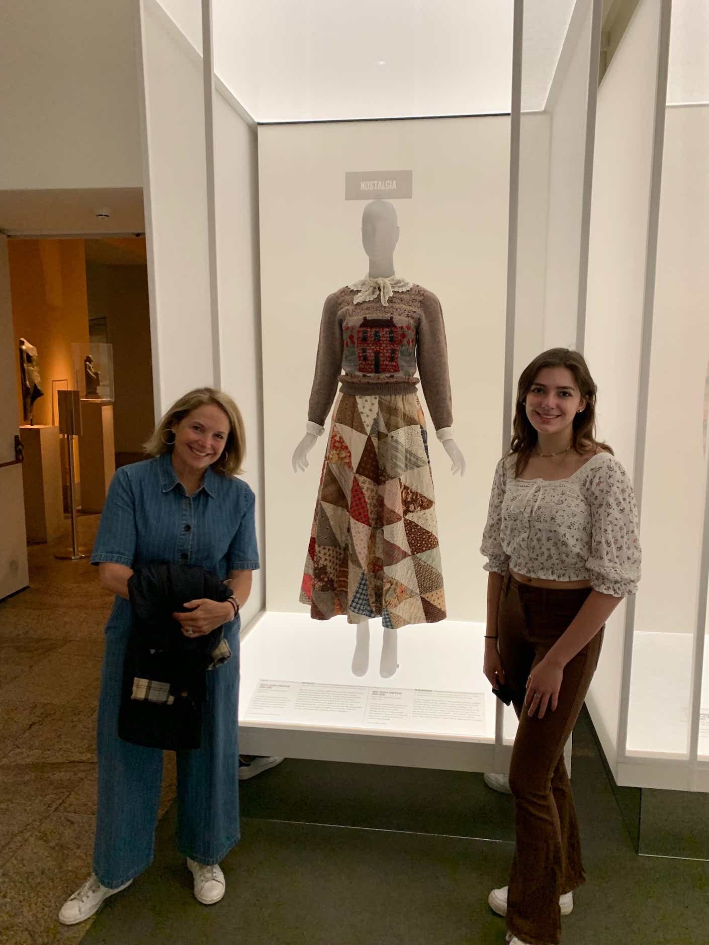 Katie Couric and her great niece at the American fashion exhibit at the Met