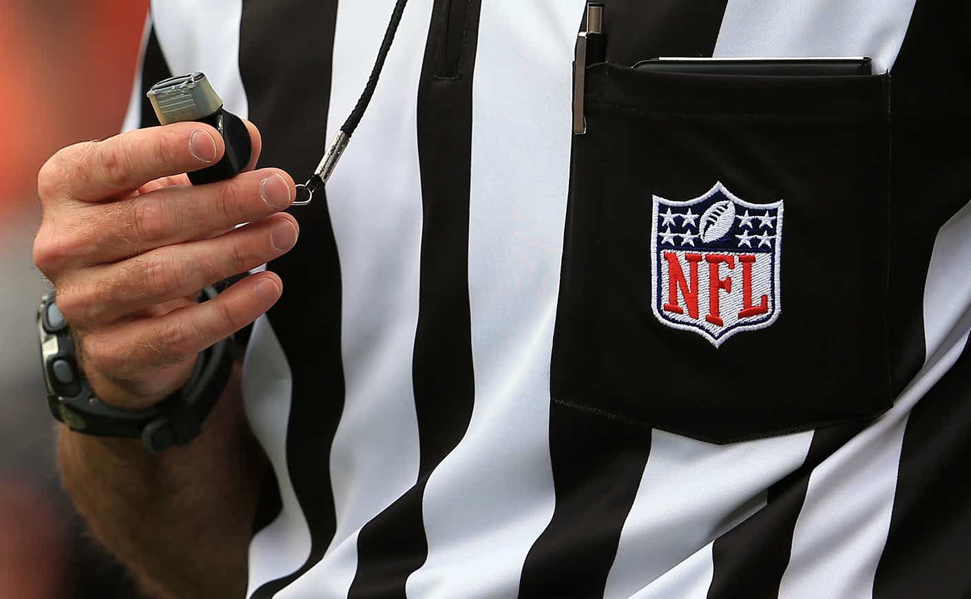 a close up of an NFL referee