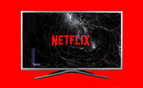 the netflix logo on a cracked tv screen
