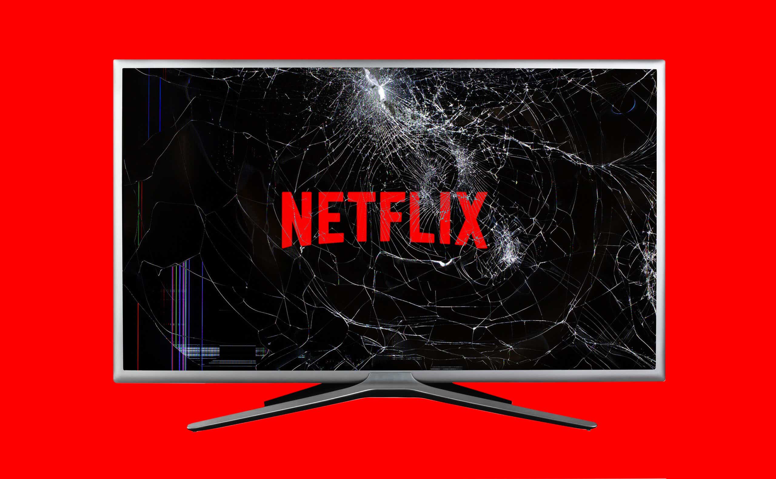the netflix logo on a cracked tv screen