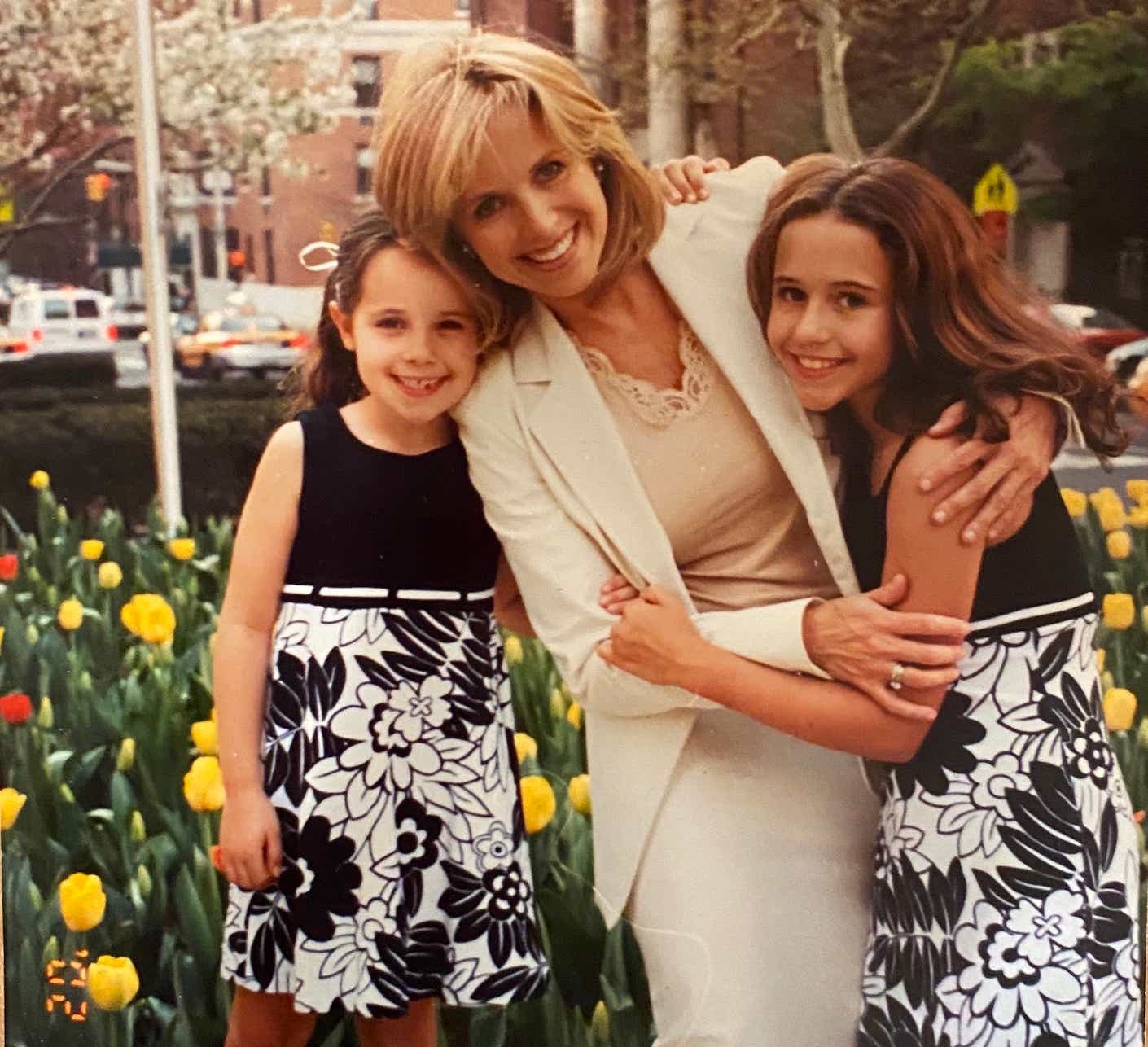 katie couric and her daughers in front of tulips