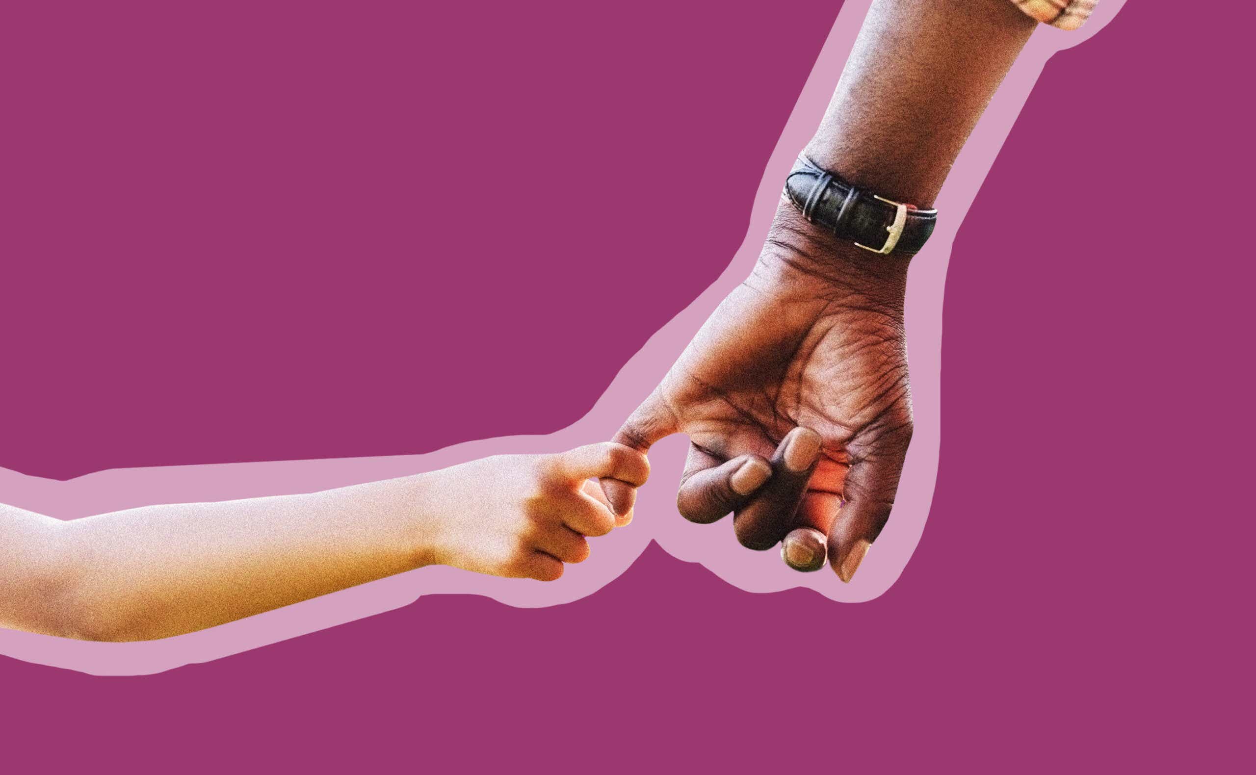 A grandparent holds hands with a grandchild