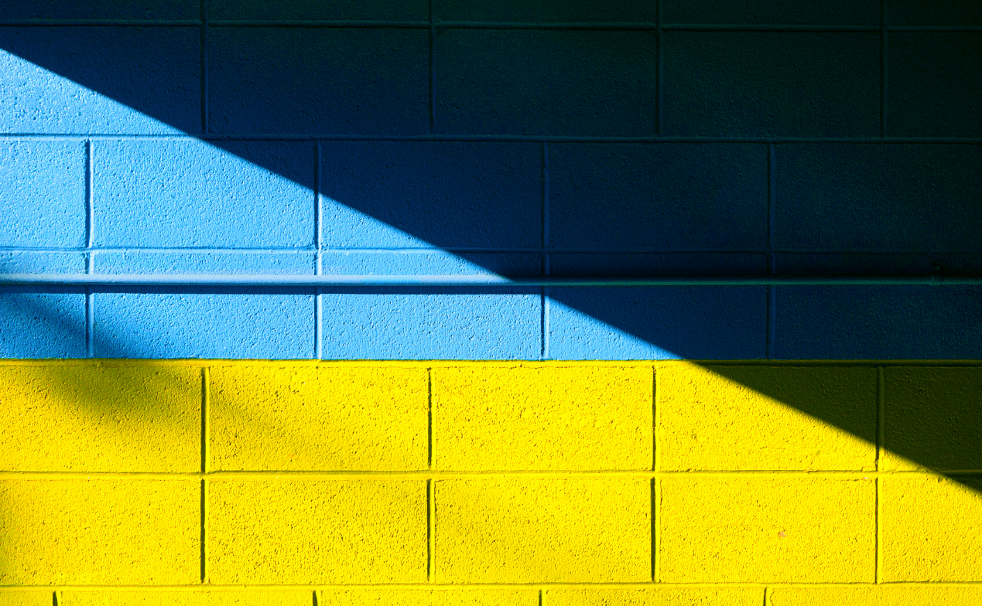 blue and yellow brick wall