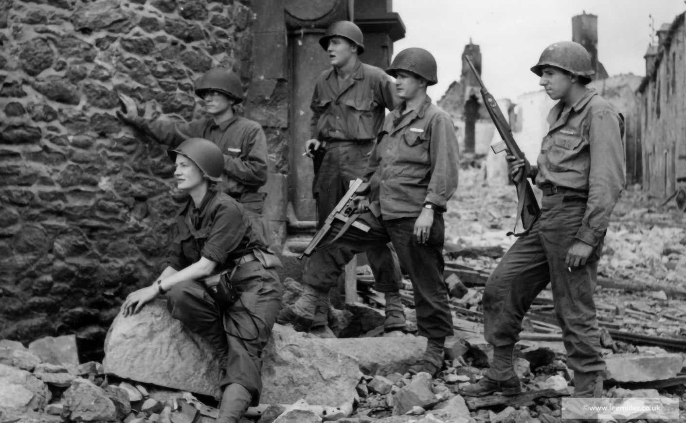 a photograph of Lee Miller and other soldiers in a war