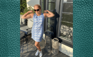 Katie Couric flexing muscles