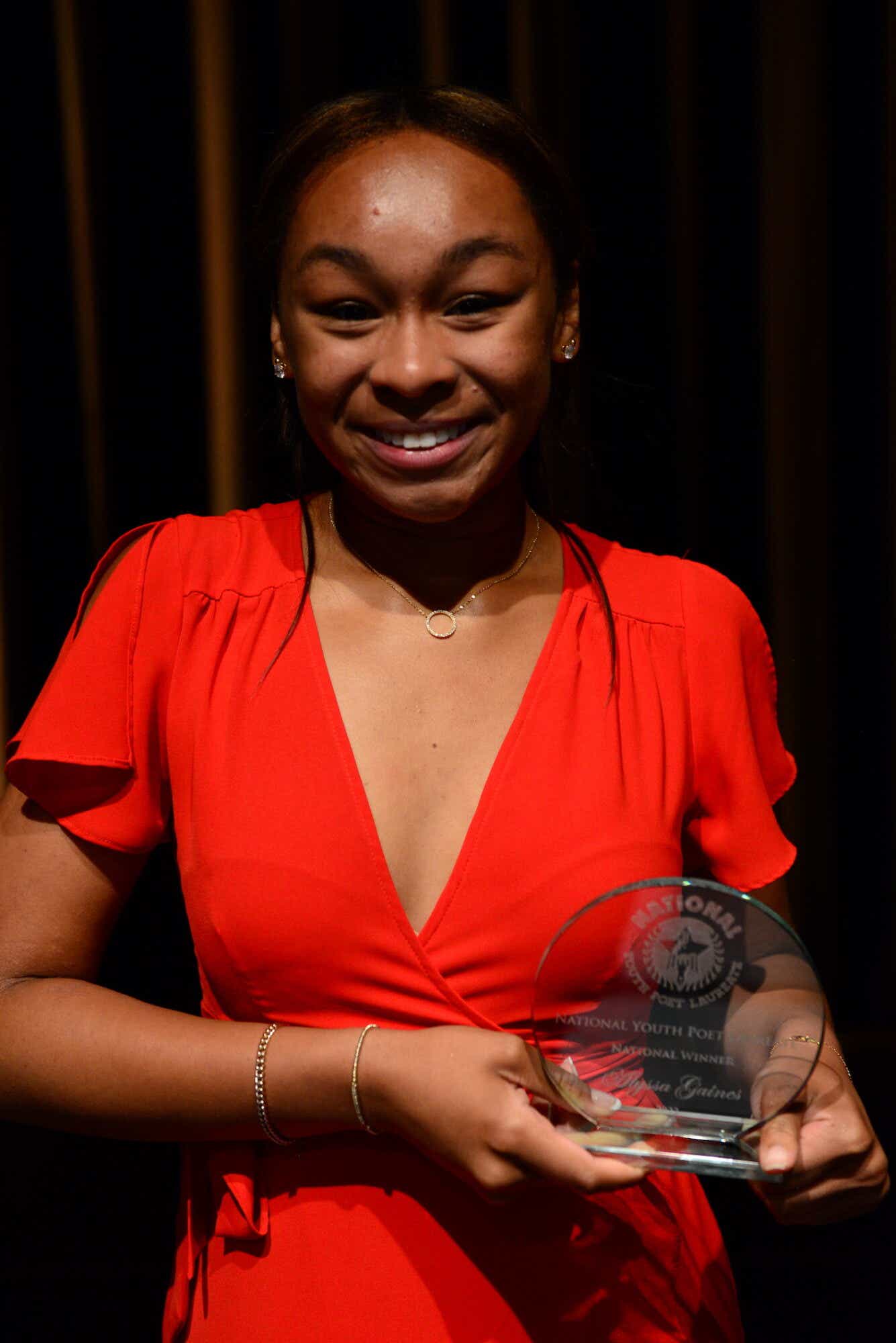 poet alyssa gaines with the youth poet laureate award