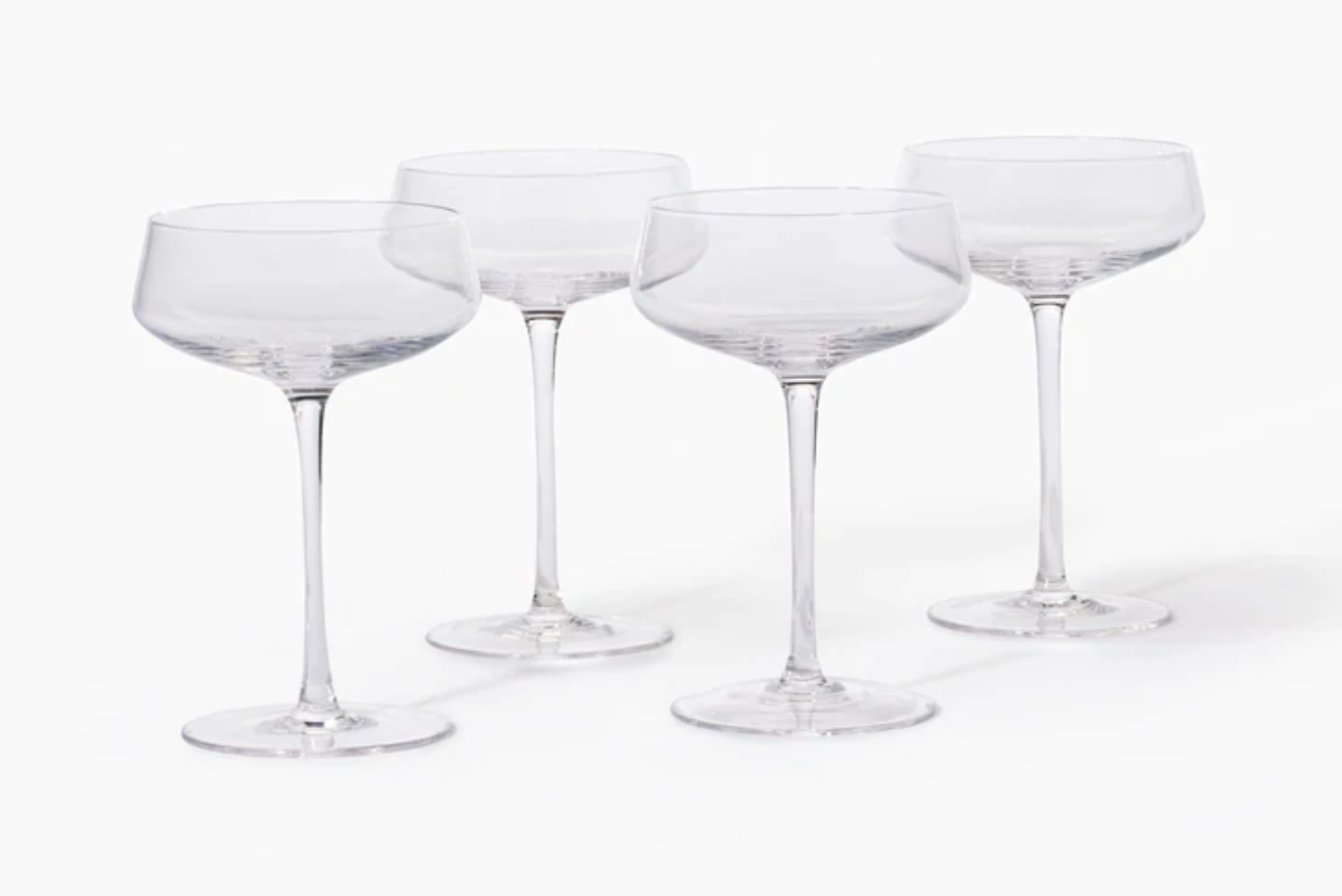 Four coupe glasses