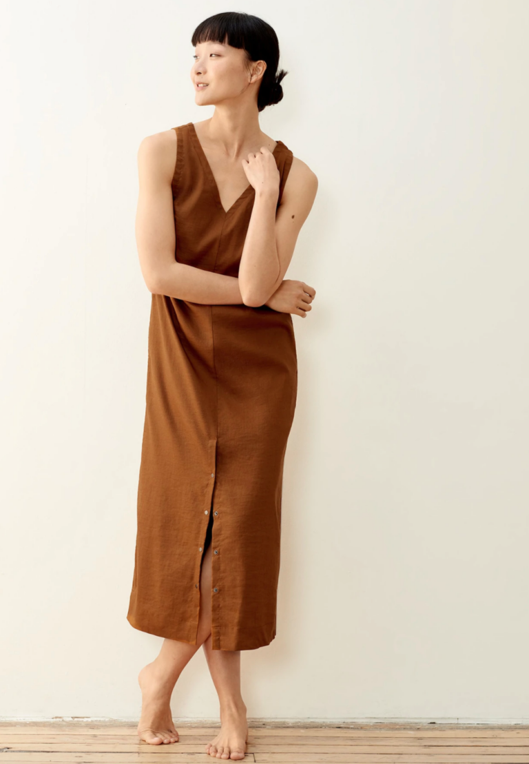 Woman wearing ankle-length brown linen dress