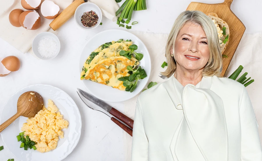 martha stewart in front of scrambled eggs and an omelet