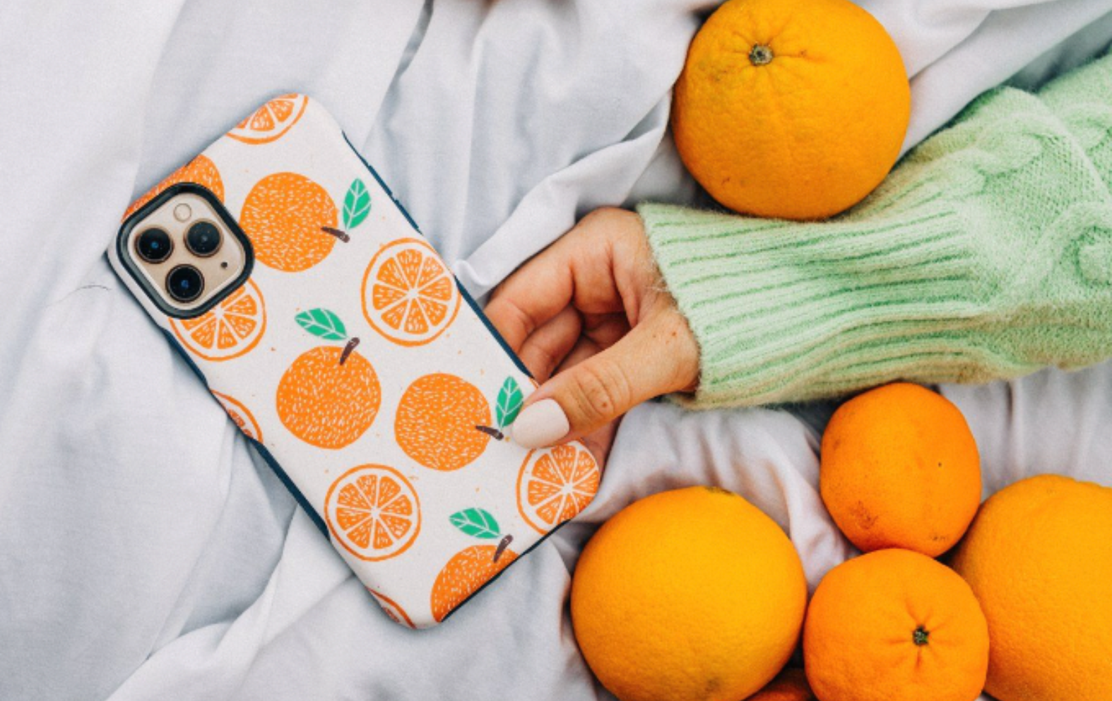 phone with case with oranges on it