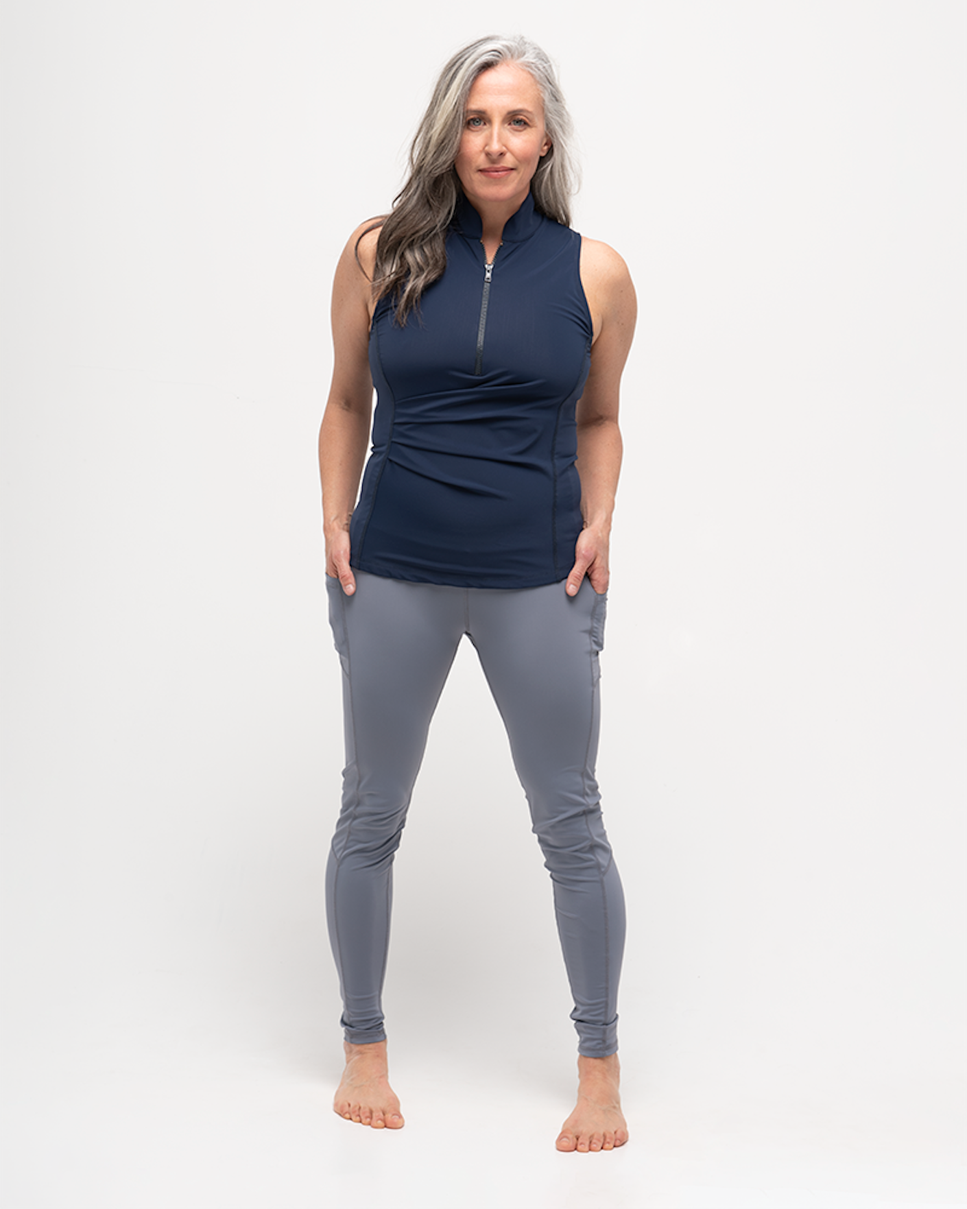 a woman in sun protection leggings