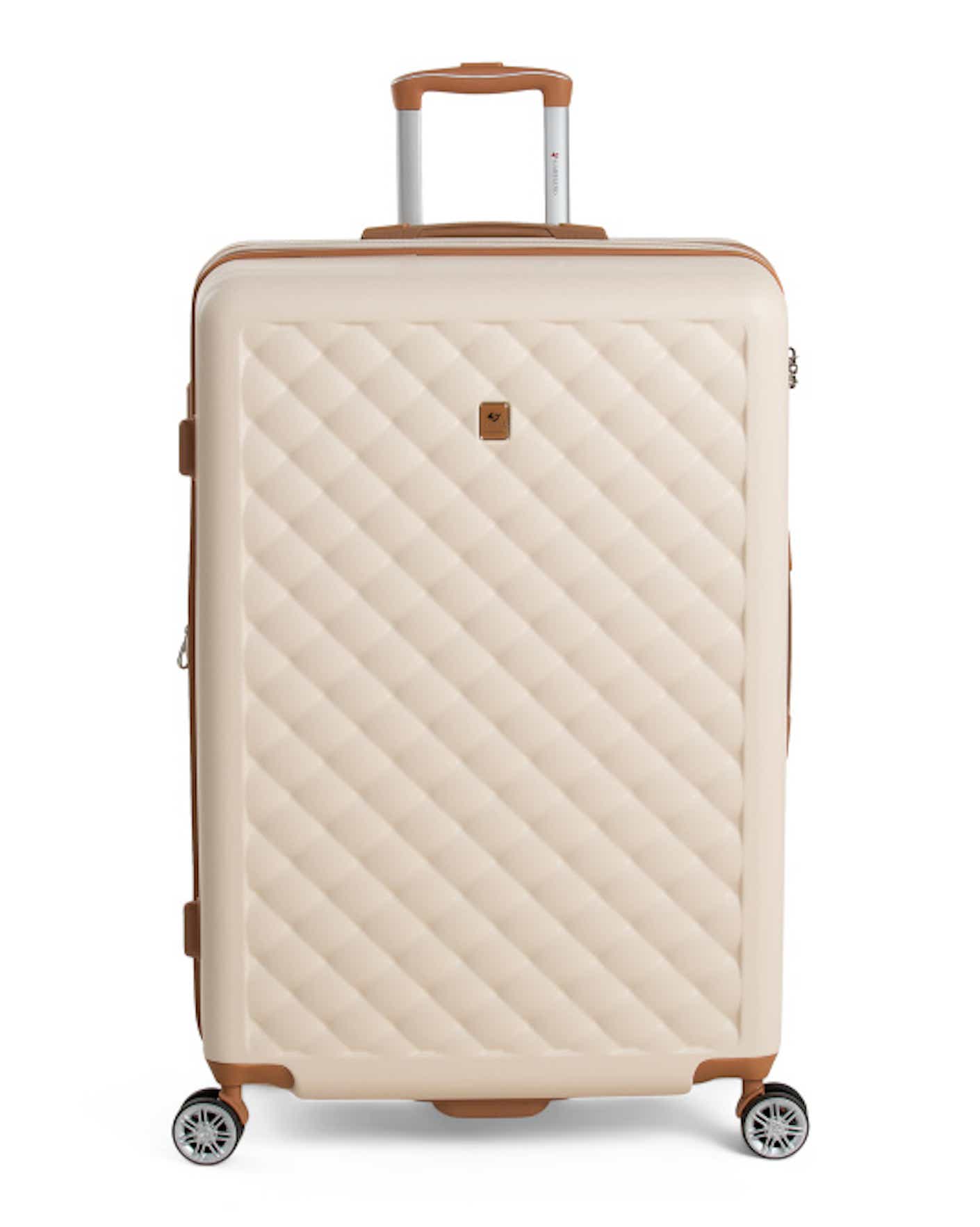A cream colored suitcase with textured detailing and maroon detailing against a white background.