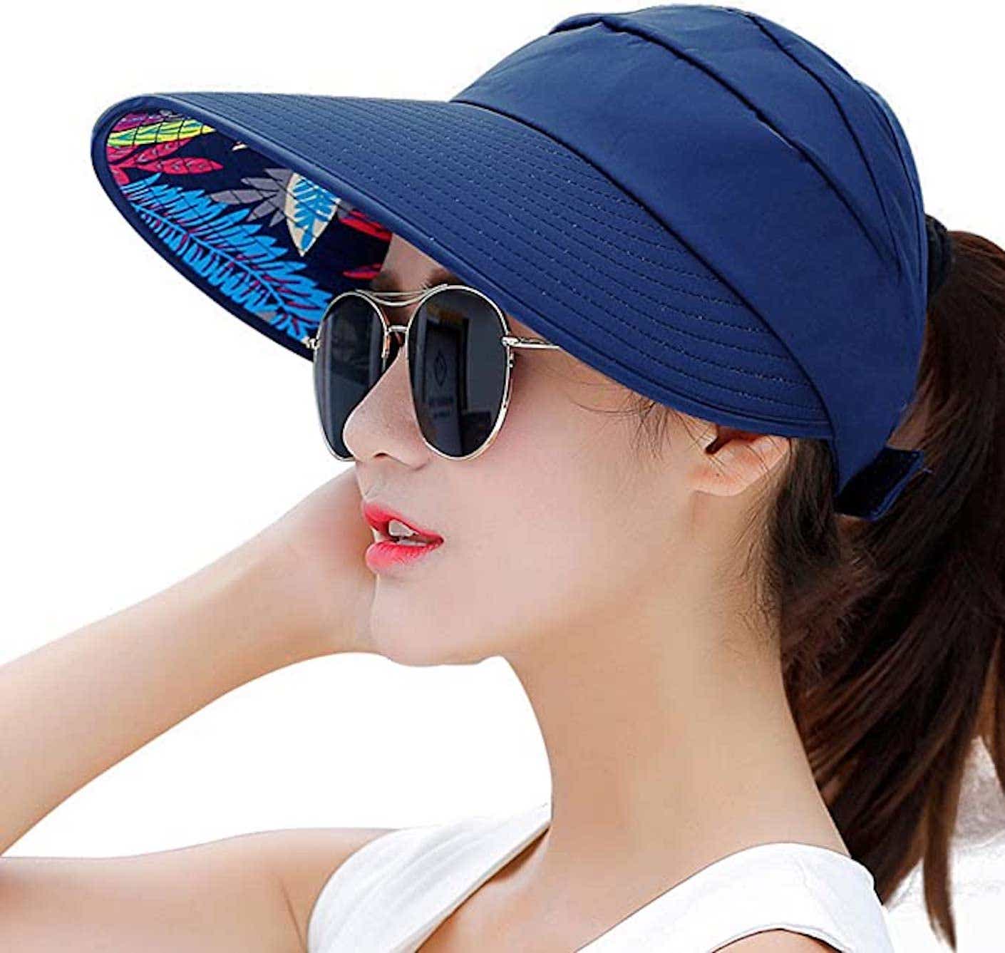 a woman wearing a sun visor