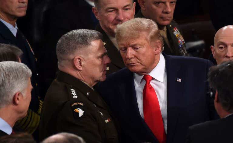 Chairman of the Joint Chiefs of Staff Gen. Mark Milley chats with US President Donald Trum