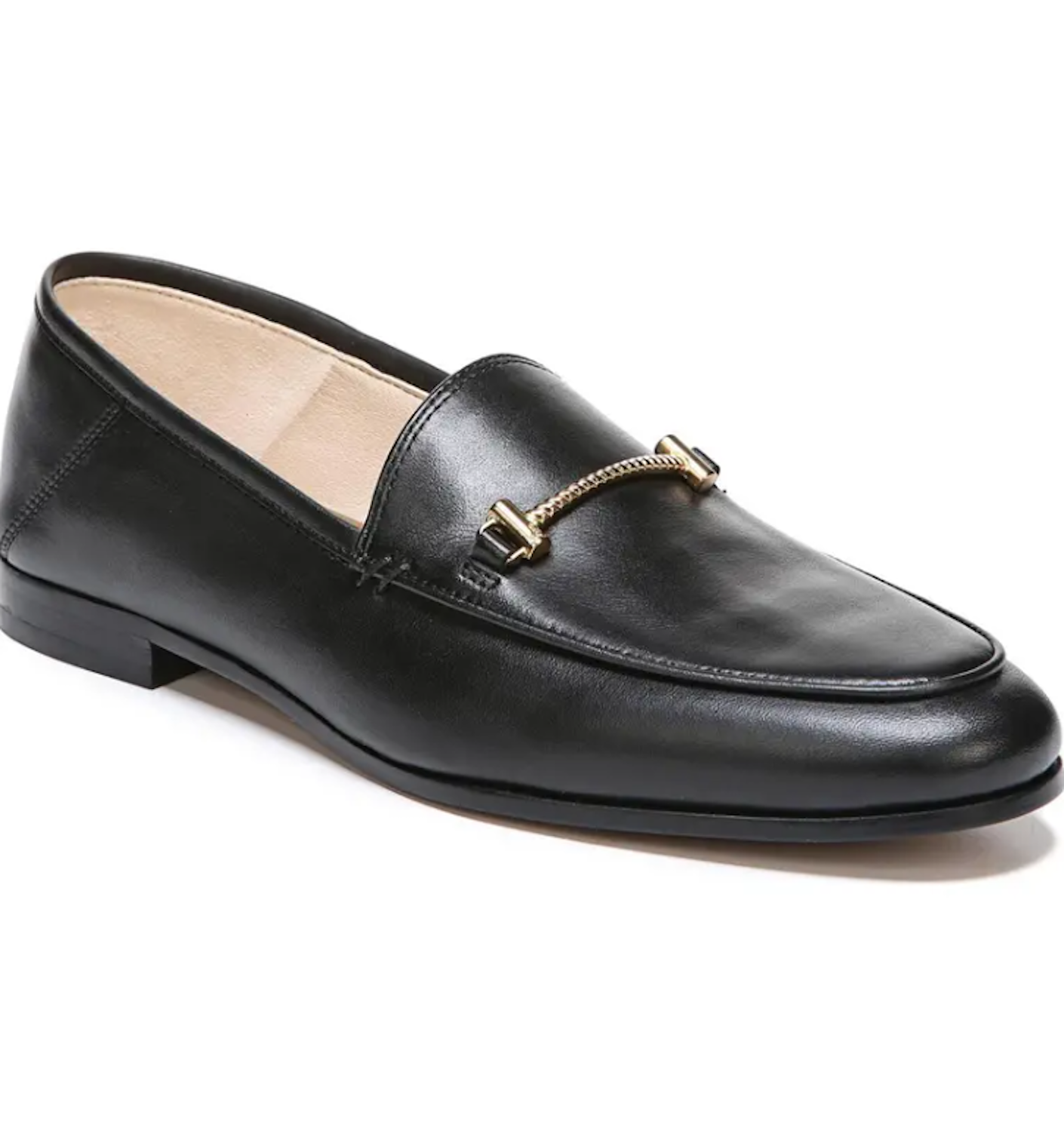 A classic black leather loafer with chain hardware detail is pictured in front of a white background.