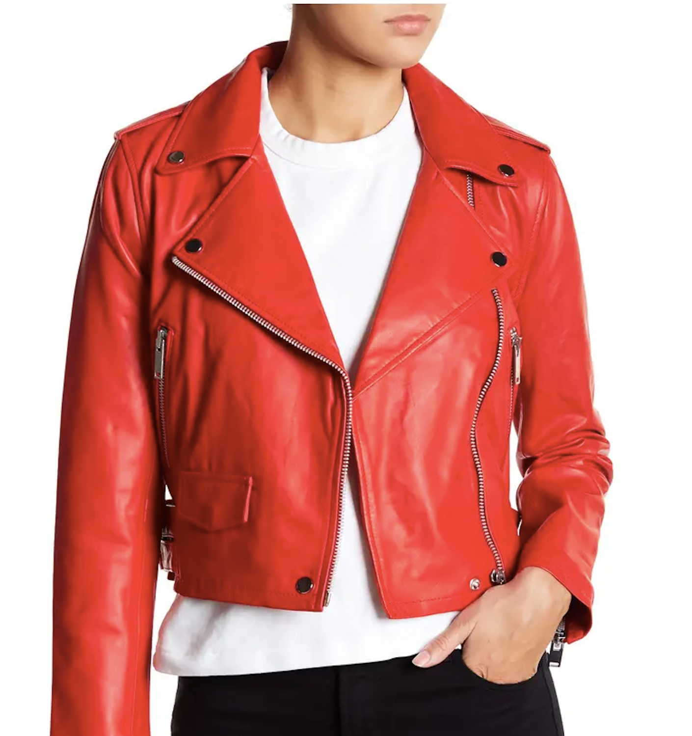 A person wearing a white t shirt and black jeans also wears a bright red leather moto jacket with prominent lapels.