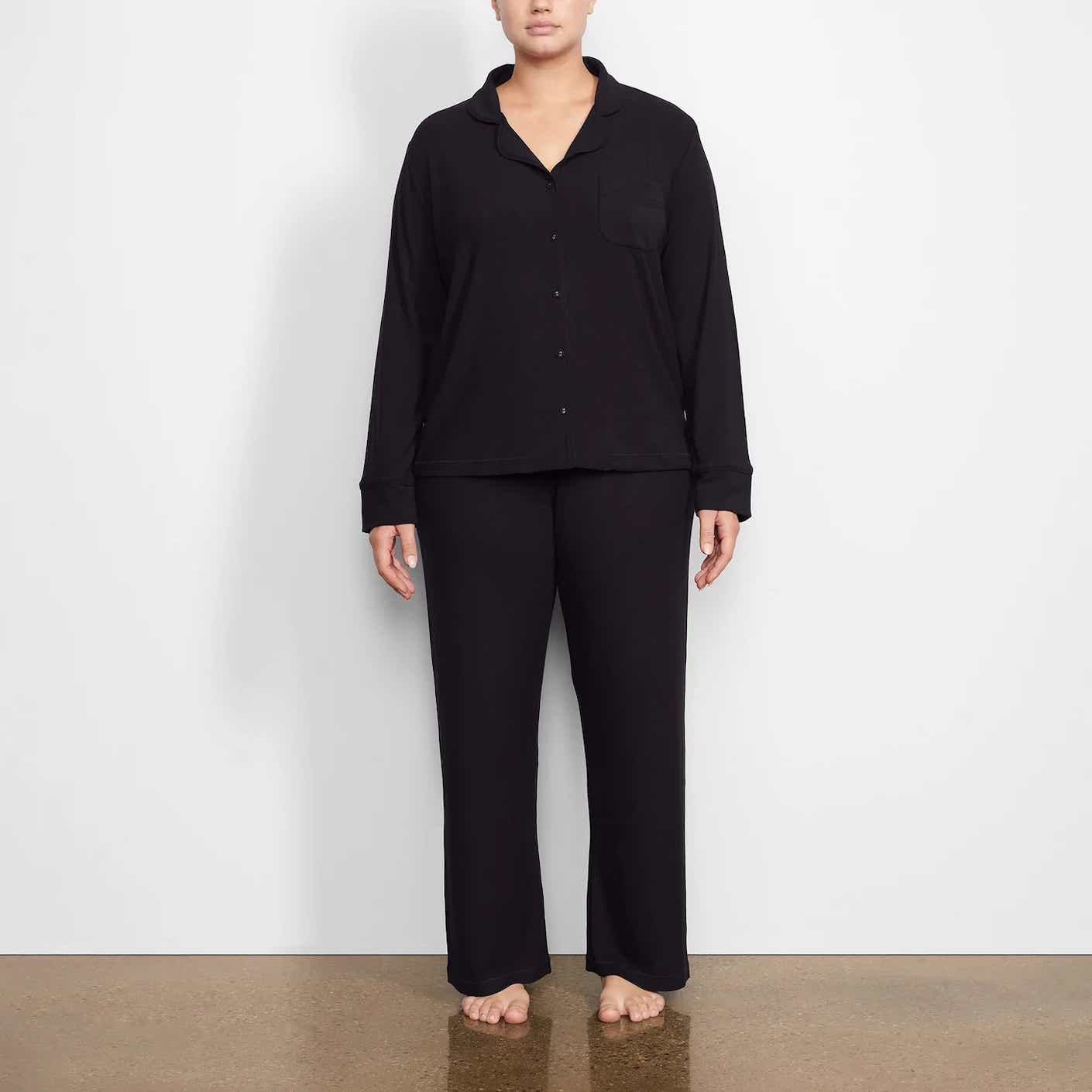 woman wearing black pajama set