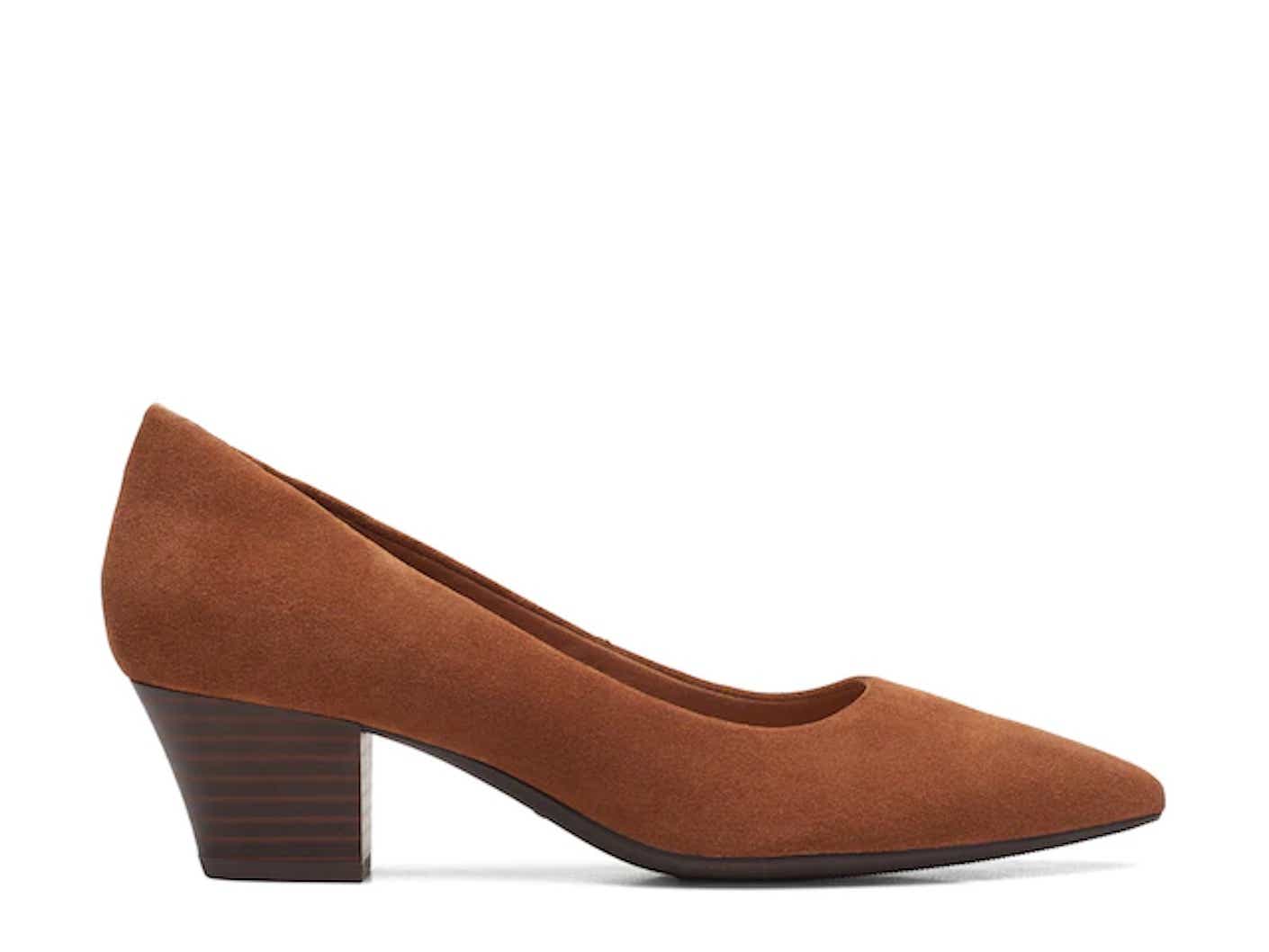 A chesnut brown, heeled pump pictured in front of a white background.