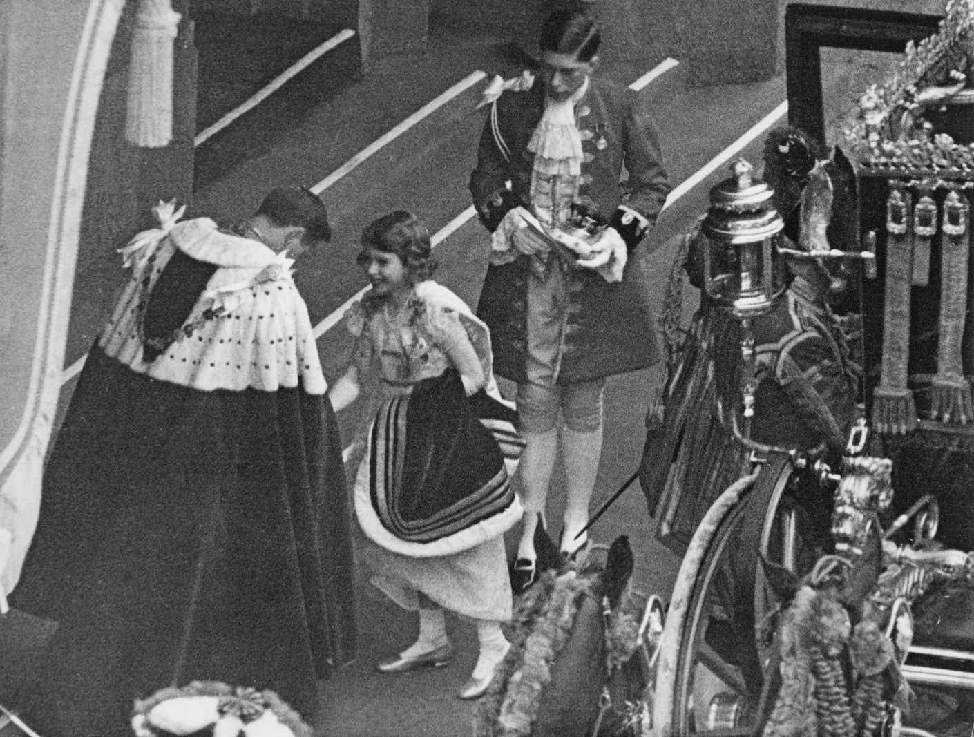 The future Queen Elizabeth II arrives at Westminster Abbey for the coronation of her father, King George VI, 12th May 1937.