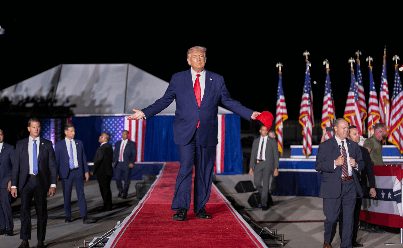 Trump walking down a red carpet