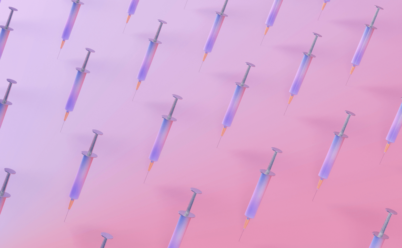 hypodermic needles on a pink background
