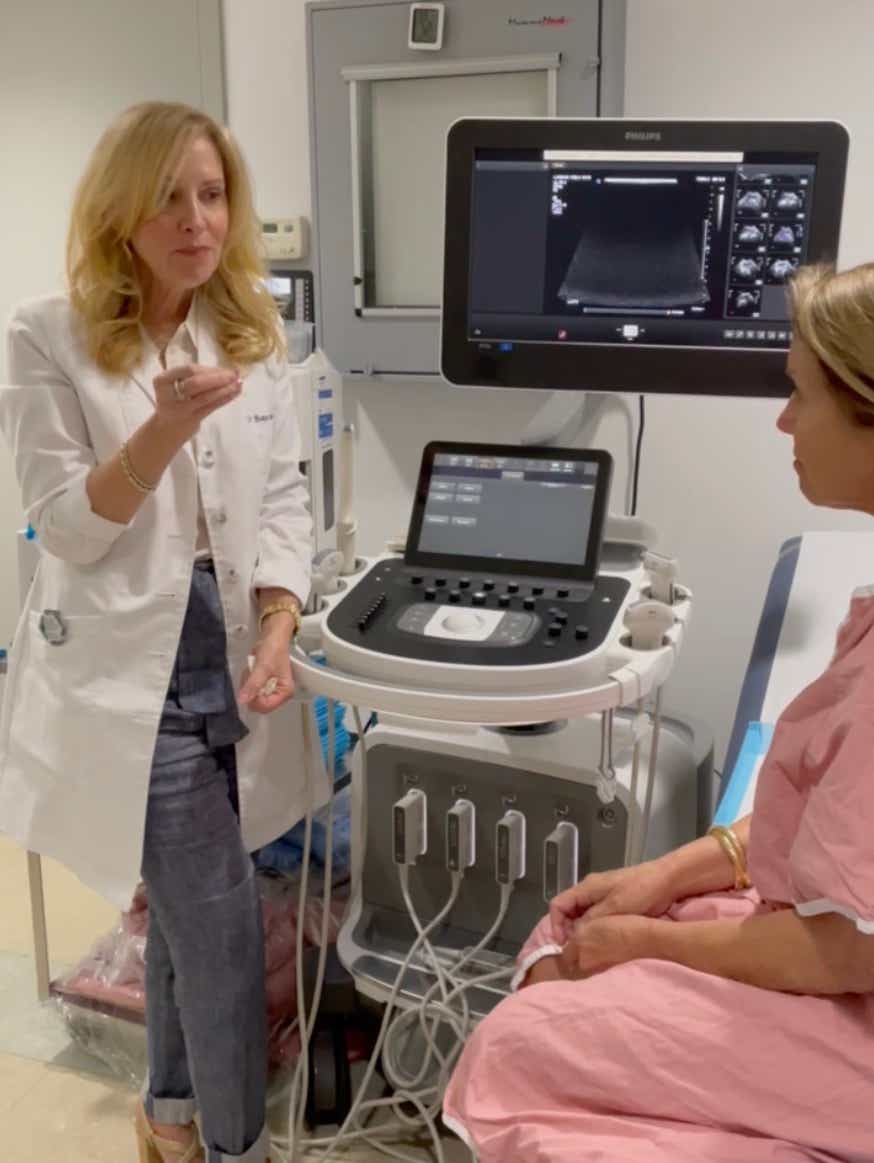 katie couric with her doctor at the hospital 