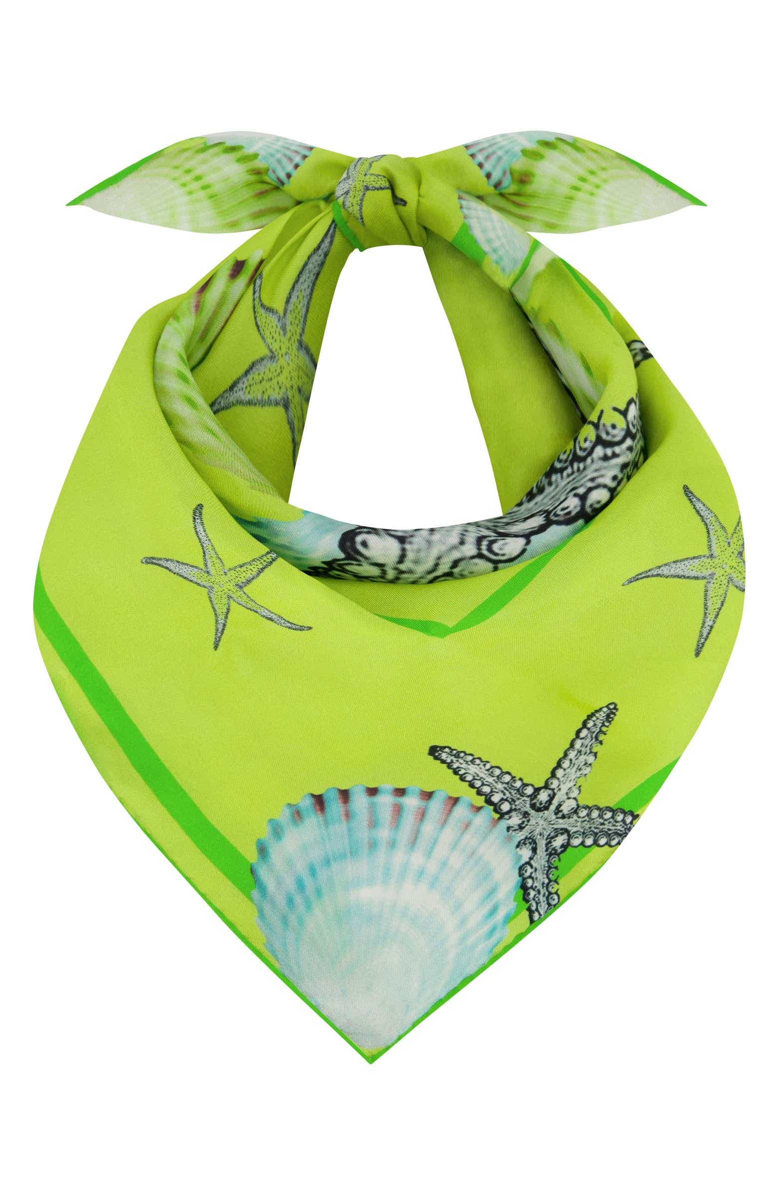 green silk scarf tied with shells