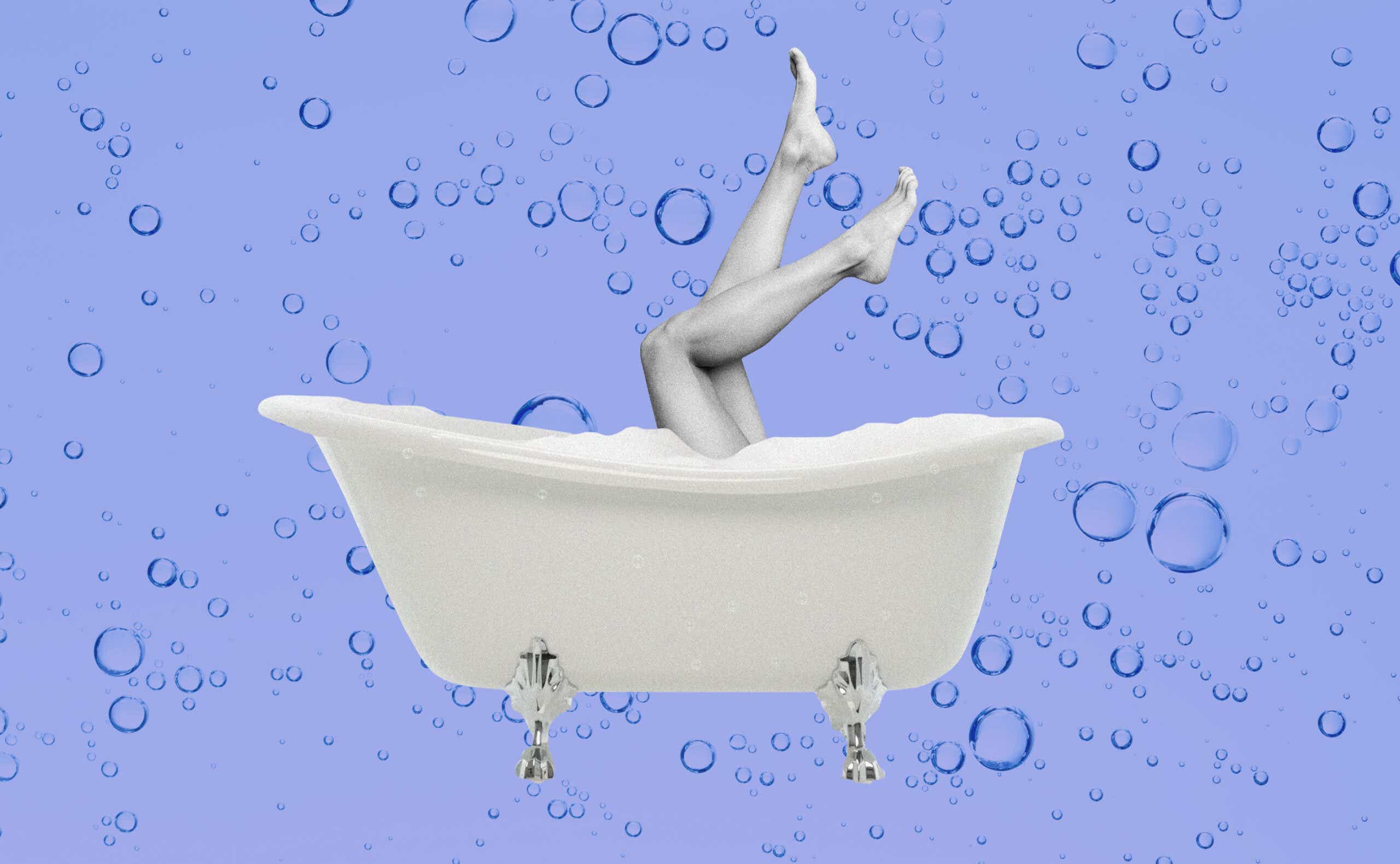 woman in bathtub washing her legs