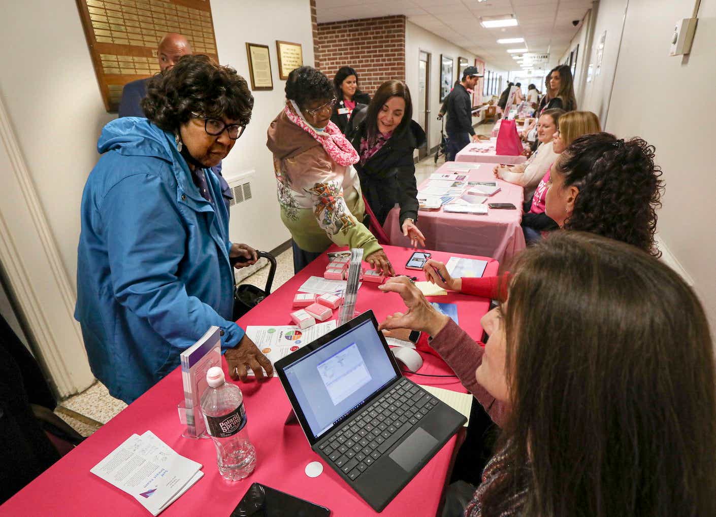 a woman signs up to get a free mammogram