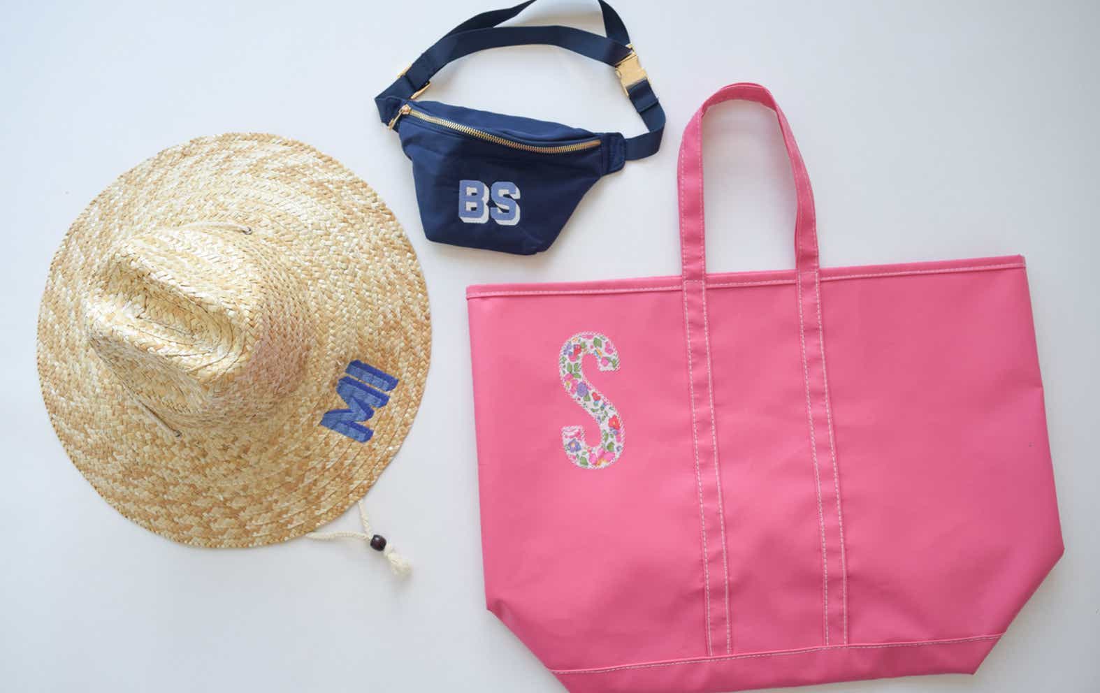 monogrammed straw hat, fanny pack, and tote bag
